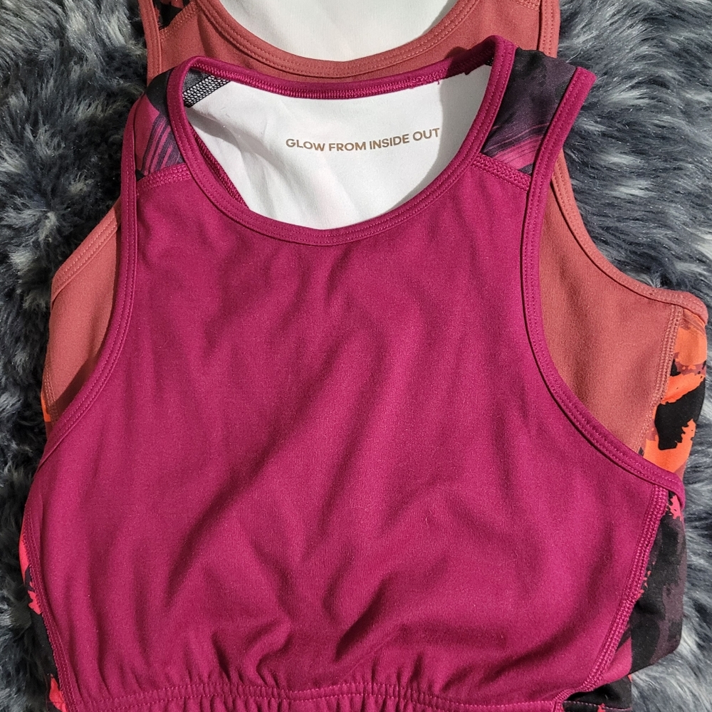 Two Adidas sports bras